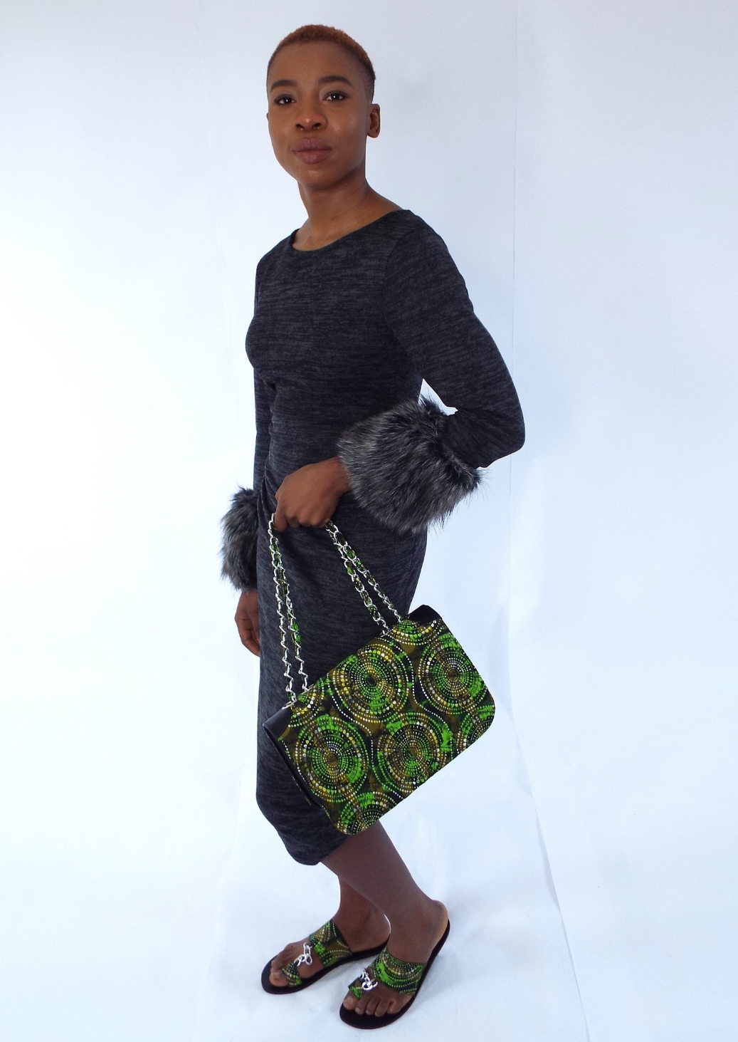 Quilted Green African Print Handbag with clasp and chain handles. Matching green African print sandals.